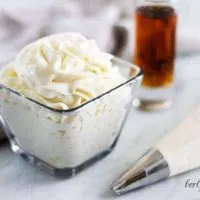 A square glass dish filled with the amaretto whipped topping.