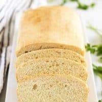 The finished english muffin bread on a rectangular plate.