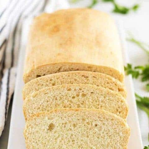 The finished English muffin bread on a rectangular plate.