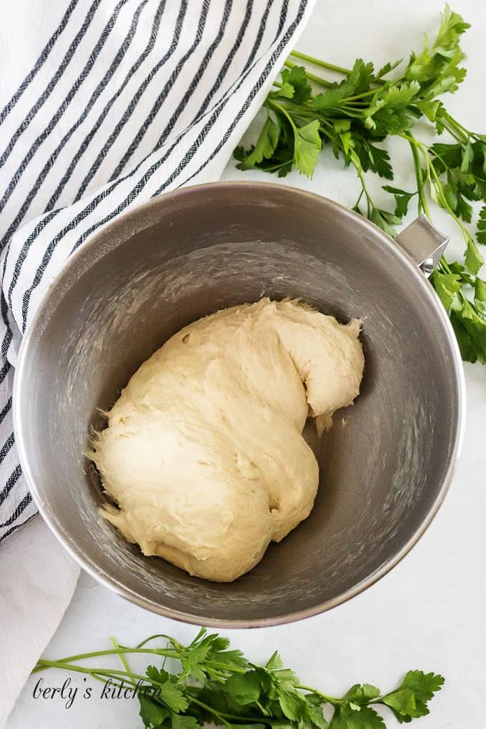 The ingredients combined in a stand mixer to make the dough.