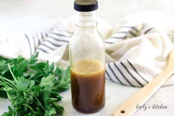 The finished Asian salad dressing stored in a sealed dressing bottle.
