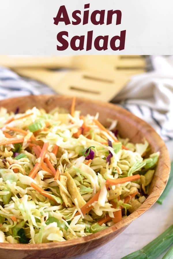 A large photo of the Asian salad served in a wooden bowl.