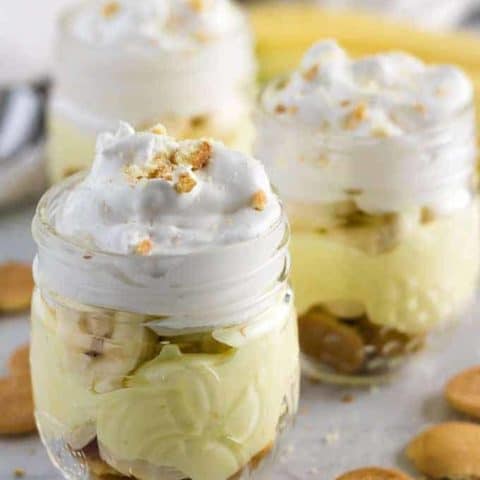 The banana pudding topped with more whipped cream and crumbled wafers.