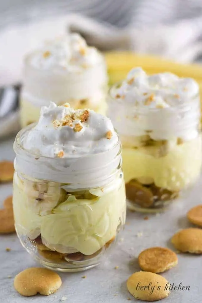 The banana pudding topped with more whipped cream and crumbled wafers.