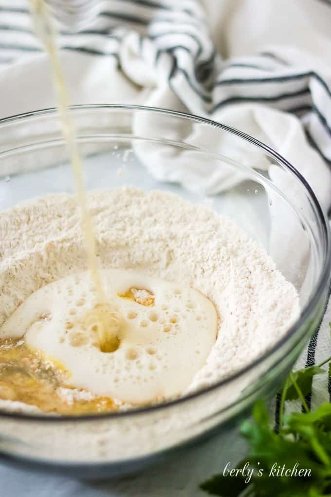 The egg, flour, lager, and seasoning mix in a large bowl.