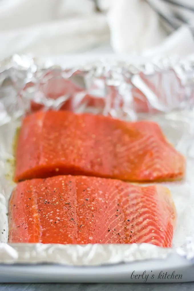 We've topped the salmon with olive oil, salt, and pepper.