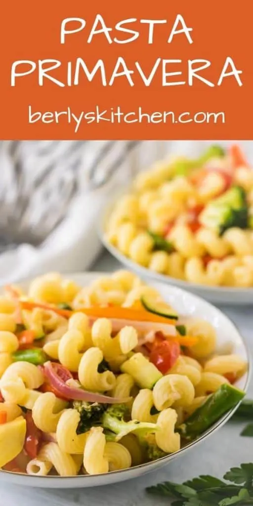 Two large pasta bowls filled with the easy pasta primavera.