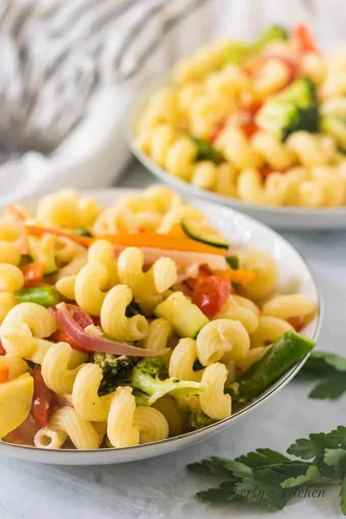 A close-up of the pasta primavera served in a pasta bowl.