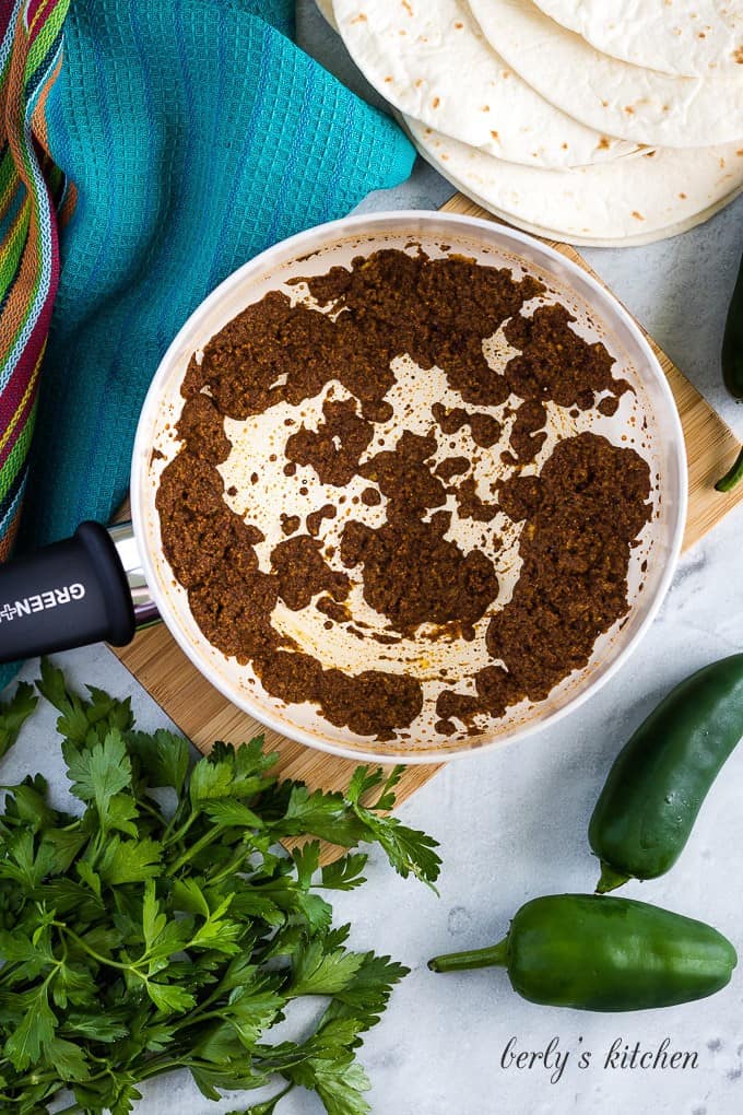 The spices have been added to the cooked flour and oil.