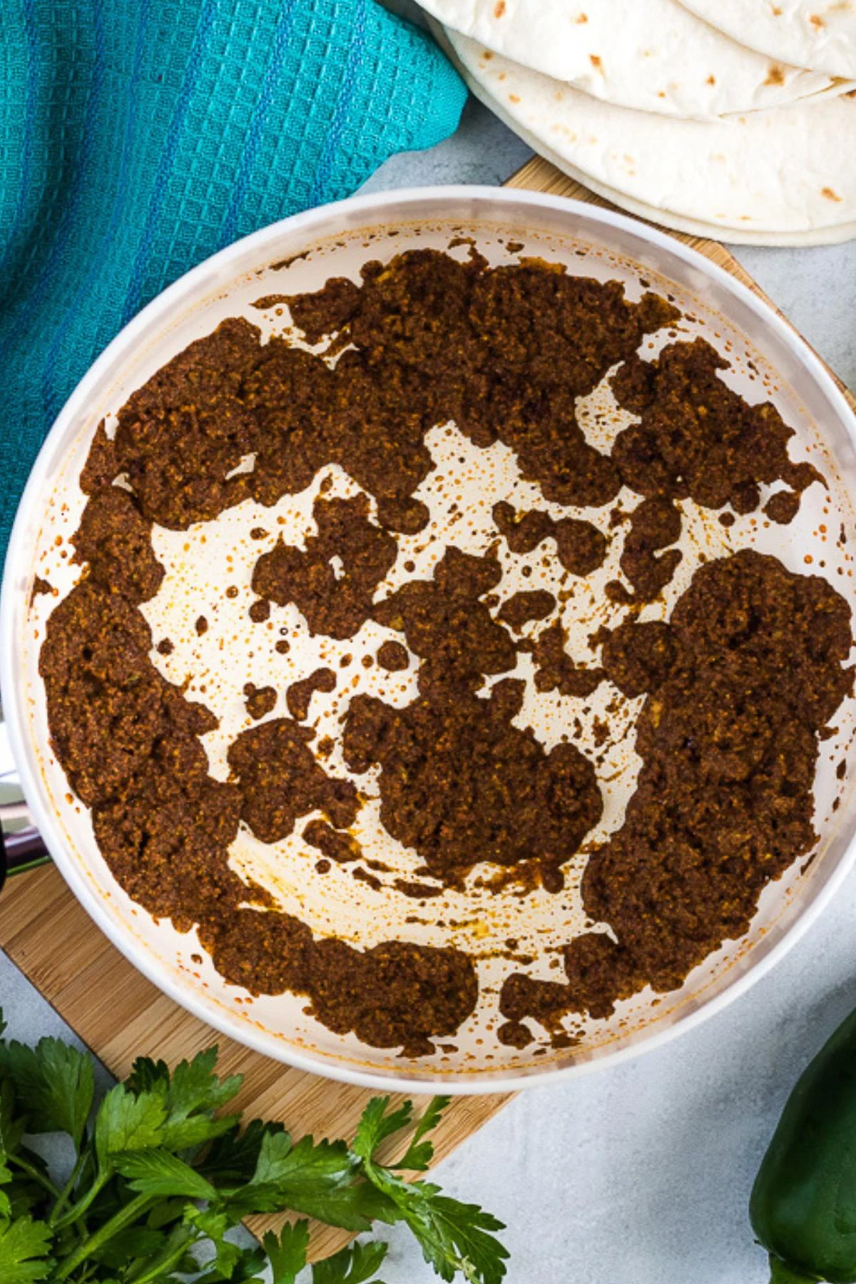 The spices have been added to the cooked flour and oil.