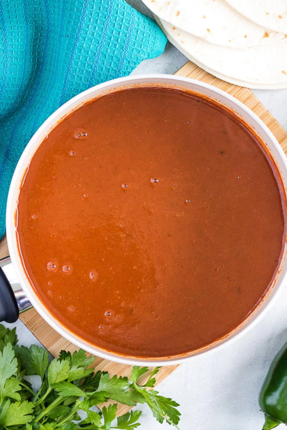 An aerial view of the mixed ingredients simmered in a saucepan.