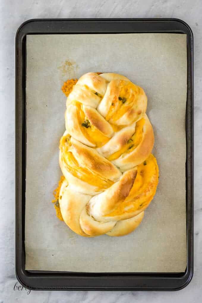Ariel view of jalapeno cheese braided bread on a sheet pan.