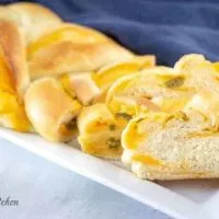 Jalapeno Cheese Braided Bread on a white platter.