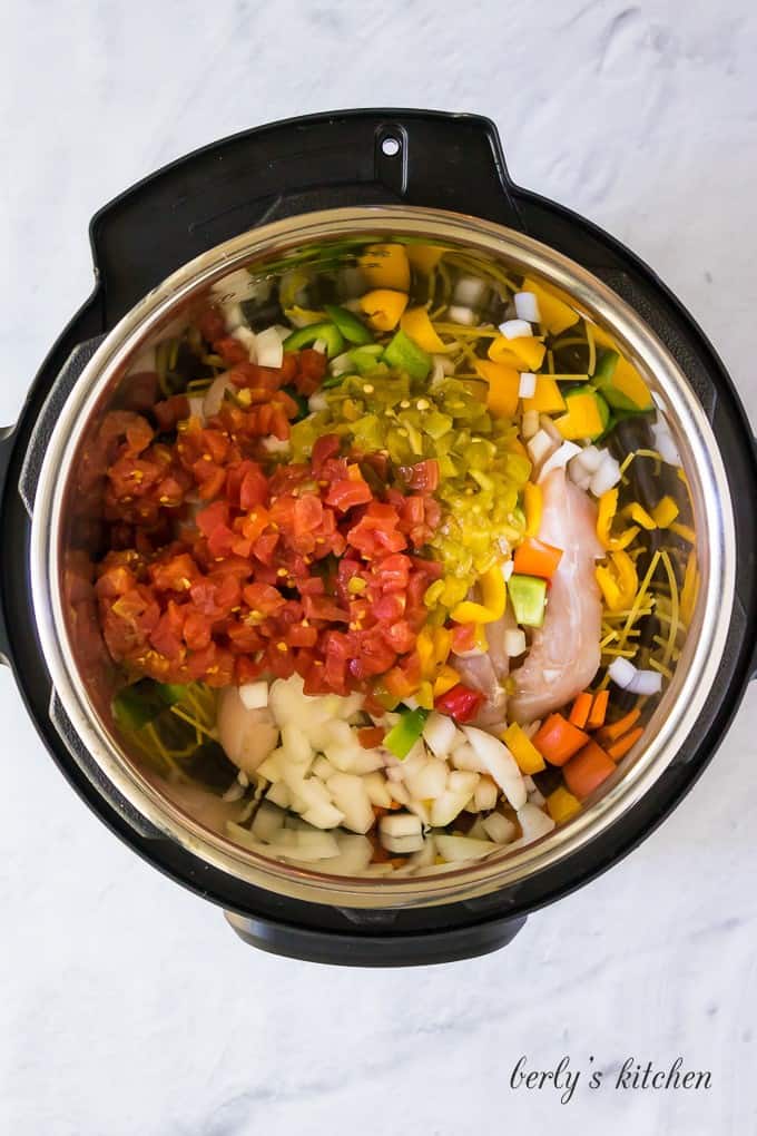 Green chilies, onions, pepper, and tomatoes added to the liner.