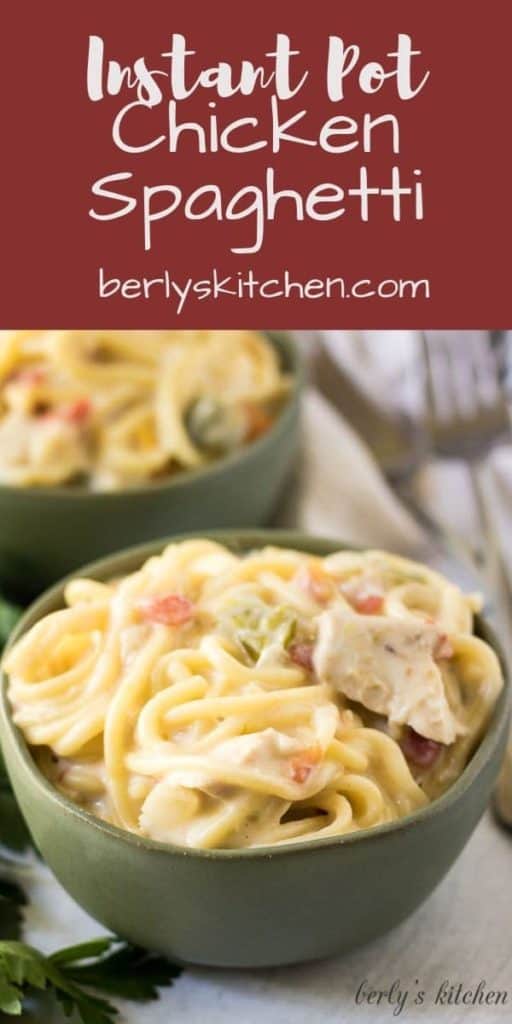 A green bowl filled with the cheesy instant pot chicken spaghetti.