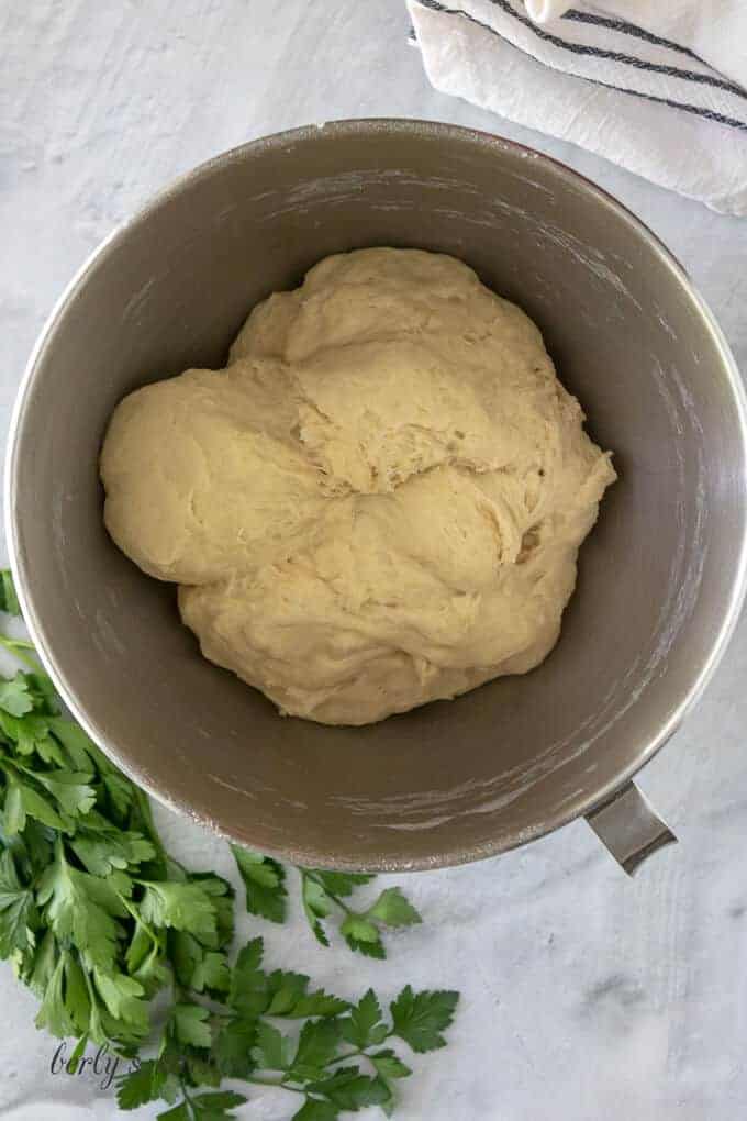 The wet and dry ingredients combined in a stand mixer.