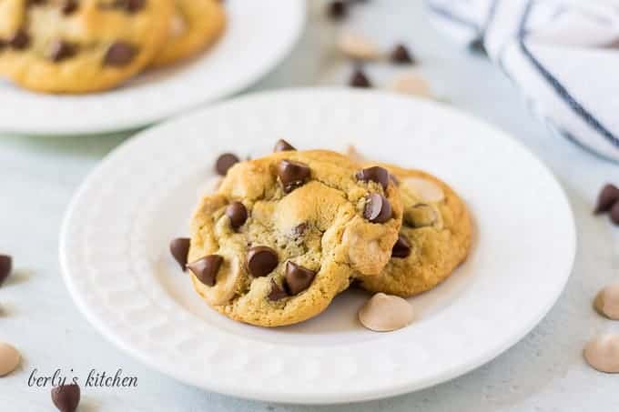 The chocolate caramel chip cookies on a white serving platter.