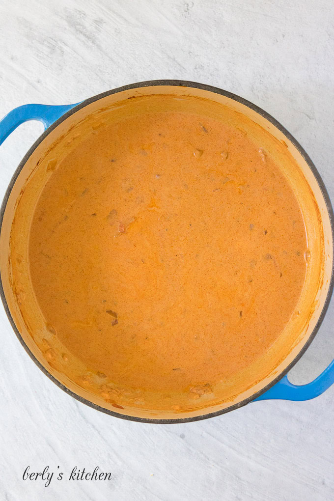 Chicken warming in paprika gravy.