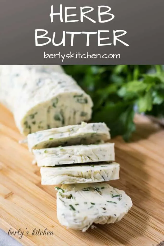 The garlic herb butter on a cutting board with parsley.