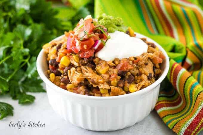 A serving of the chicken taco bowls garnished with salsa.