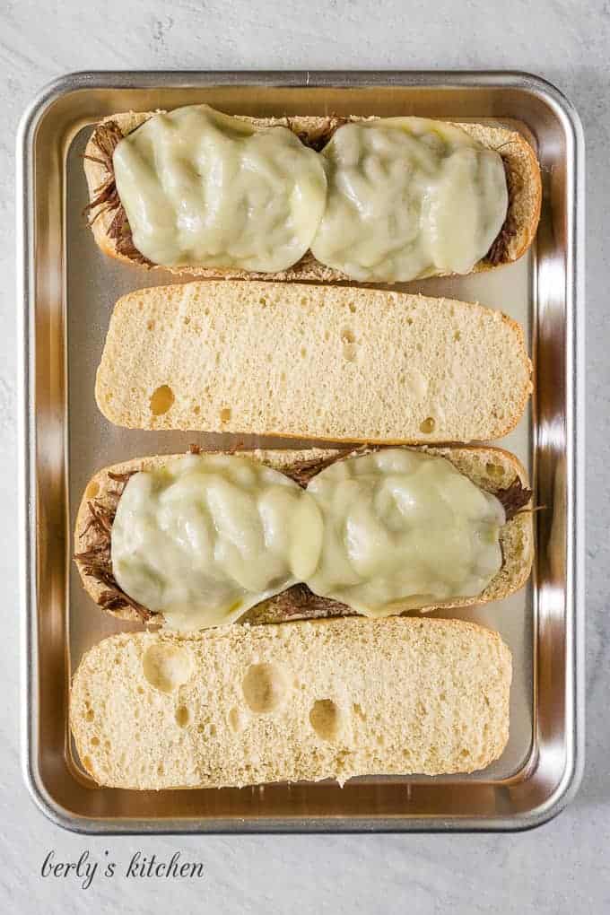 The sandwiches have been toasted and the cheese has melted.