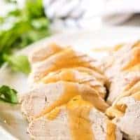 Sliced meat covered in a sweet and savory honey glaze.