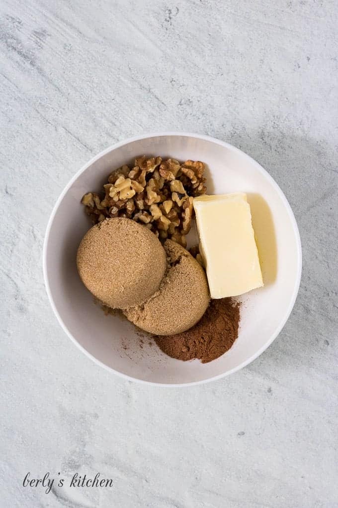 Butter, brown sugar, and other ingredients in a mixing bowl.