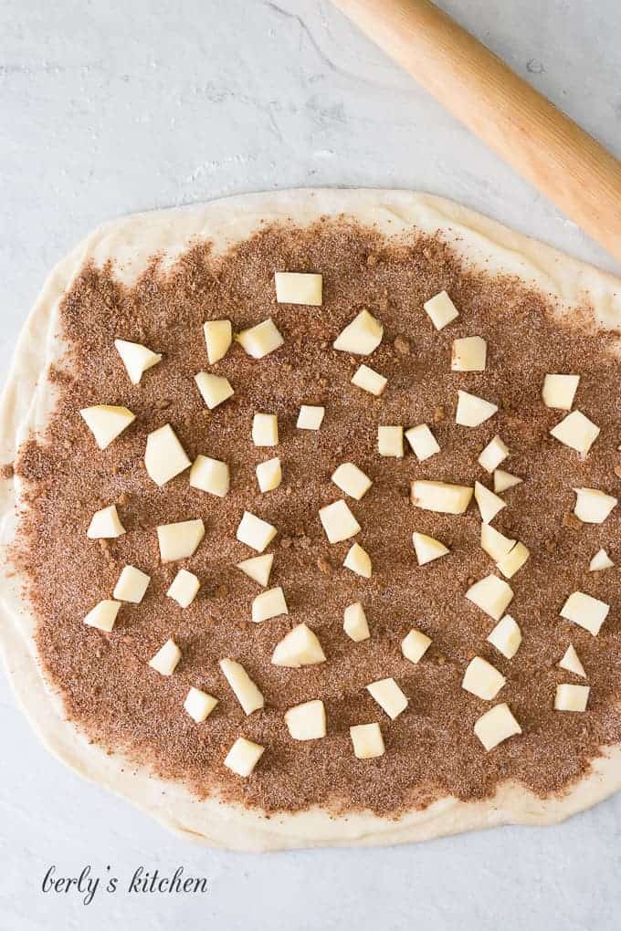 Cinnamon and apple filling has been added to the dough.