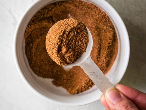 An aerial view of the seasonings lifted from the bowl.