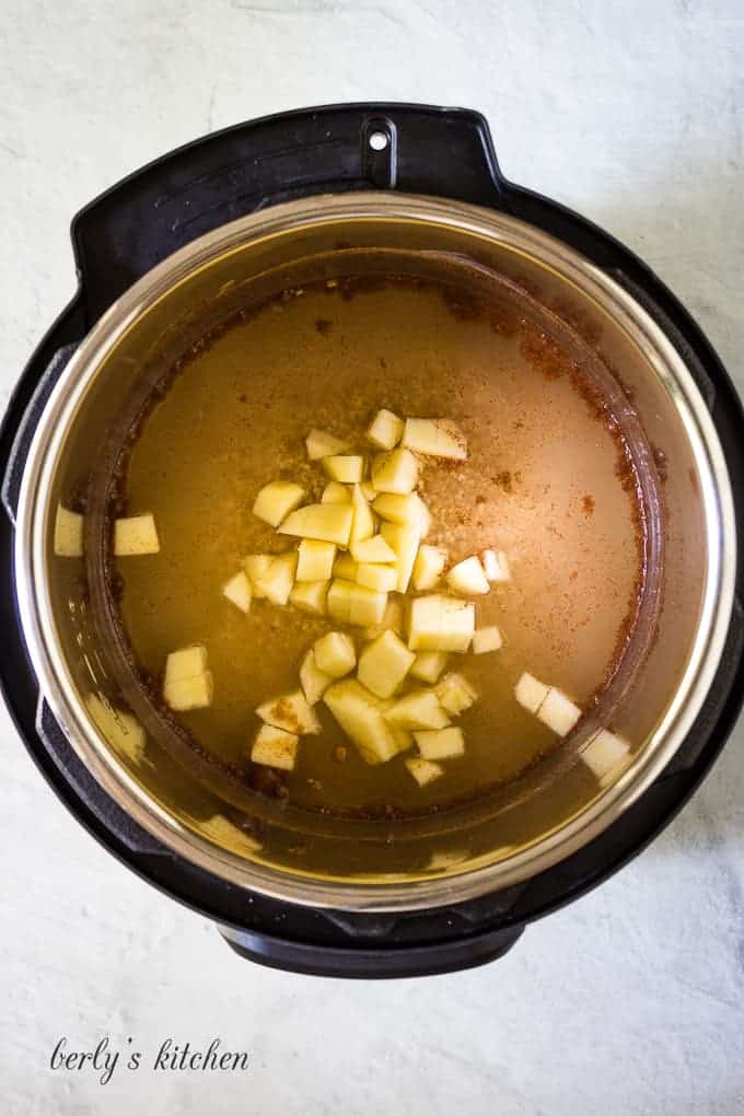 The apples, oats, and other ingredients placed into the liner.