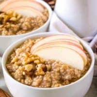 The finished steel cut oats topped with sliced apples.