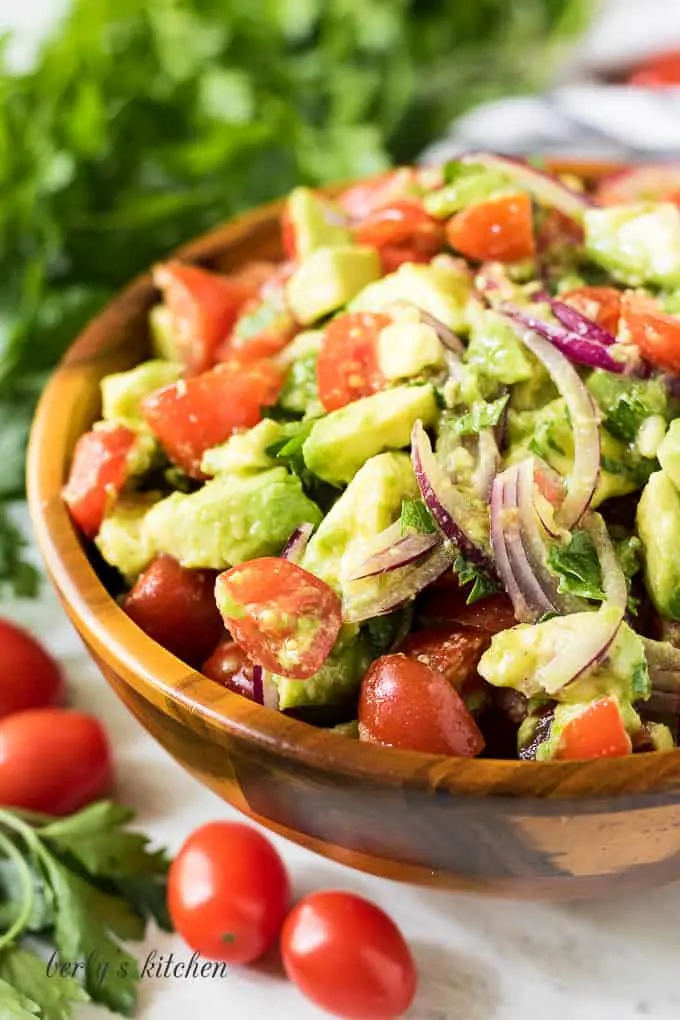 A close up view of the finished avocado tomato salad.