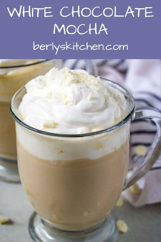 The white chocolate mocha served in a clear glass mug.
