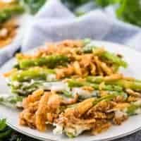 The finished green bean casserole served on a small saucer.