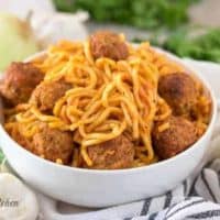 The finished Instant Pot spaghetti with meatballs in a bowl.