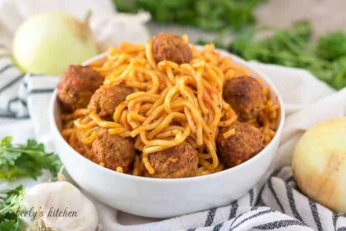 The finished instant pot spaghetti and meatballs in a bowl.