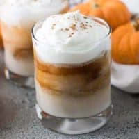 The finished pumpkin spice white Russian topped with whipped cream.