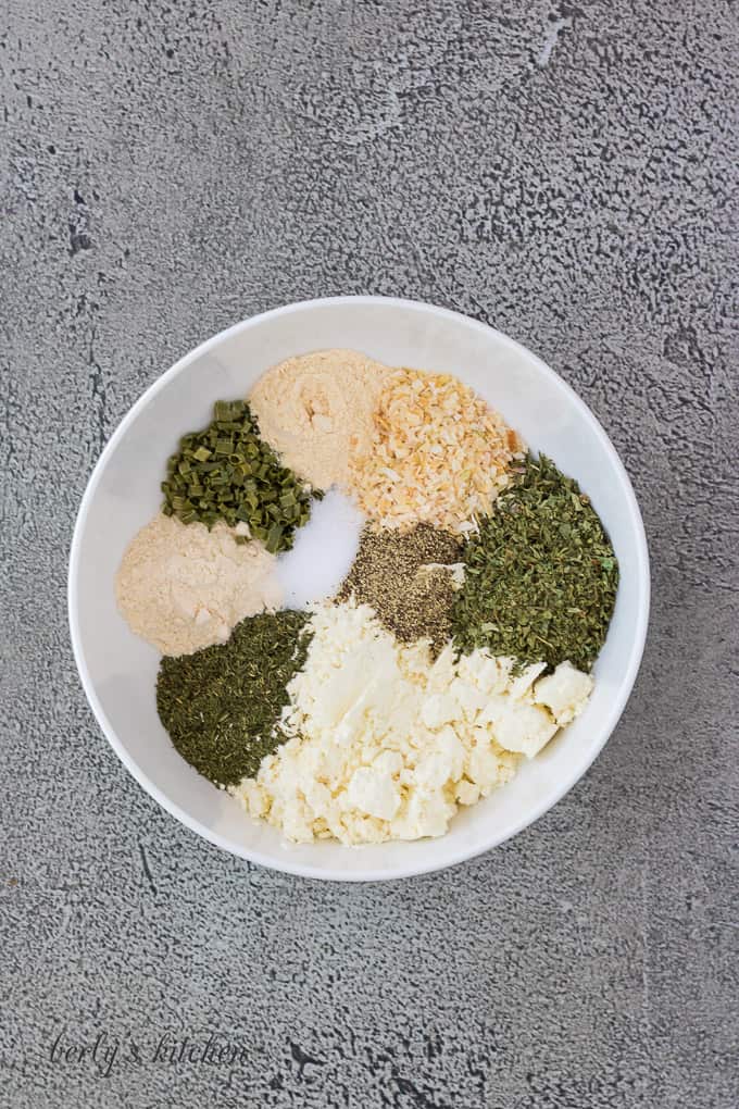 All of the spices portioned out on a small plate.