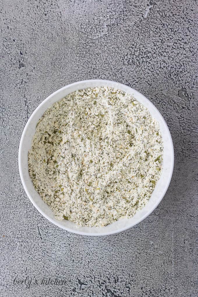 The spices have been whisked together in a small bowl.