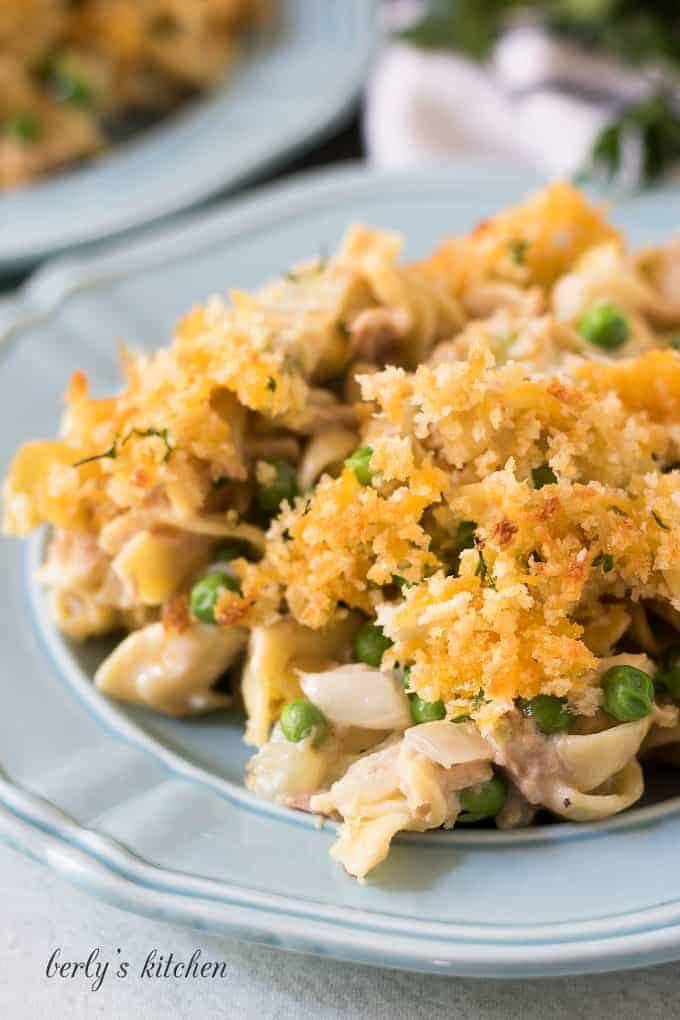 A portion of the finished casserole on a blue plate.