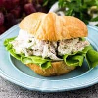 The turkey salad served on a flaky croissant with lettuce.