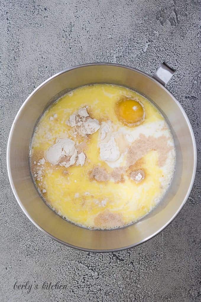 Flour, eggs, and other ingredients in a stand mixing bowl.