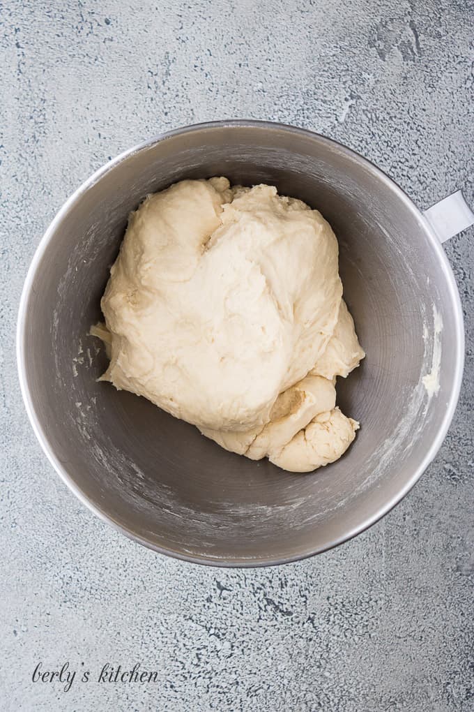 The wet dough has mixed and is ready to rise.