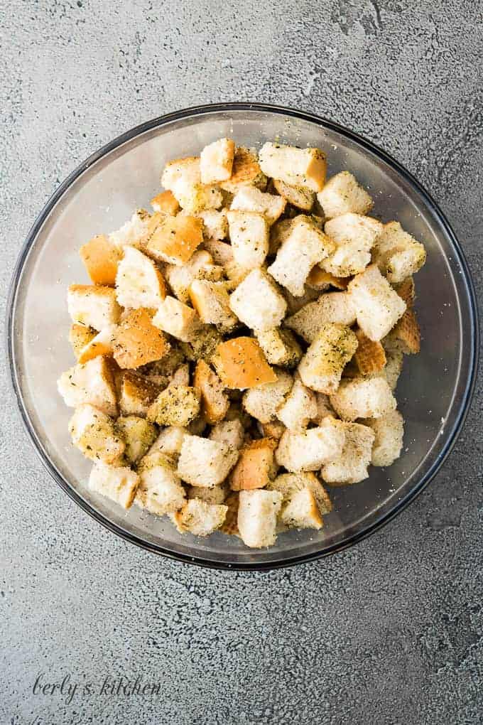 The stale bread has been tossed with the butter mixture.
