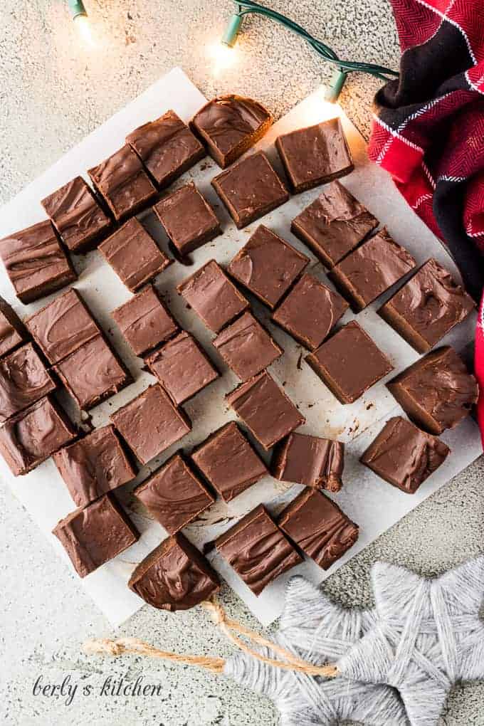 The fudge has been cut into thirty-six pieces for serving.