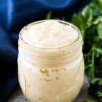 Homemade condensed cream of celery soup in a mason jar.