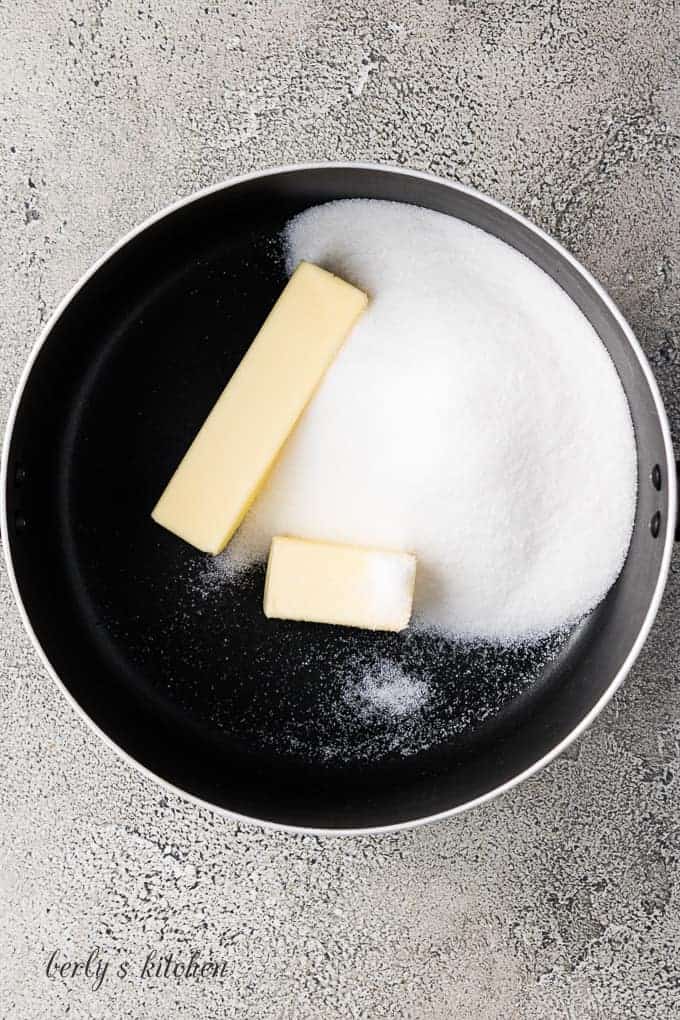 Granulated sugar and butter in a saucepan.