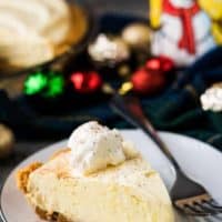 A serving of the eggnog pie topped with whipped topping.