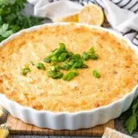 The hot crab dip baked in a white tart pan.