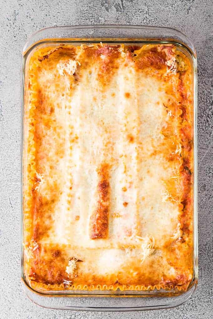 The lasagna has cooked and needs to cool before serving.